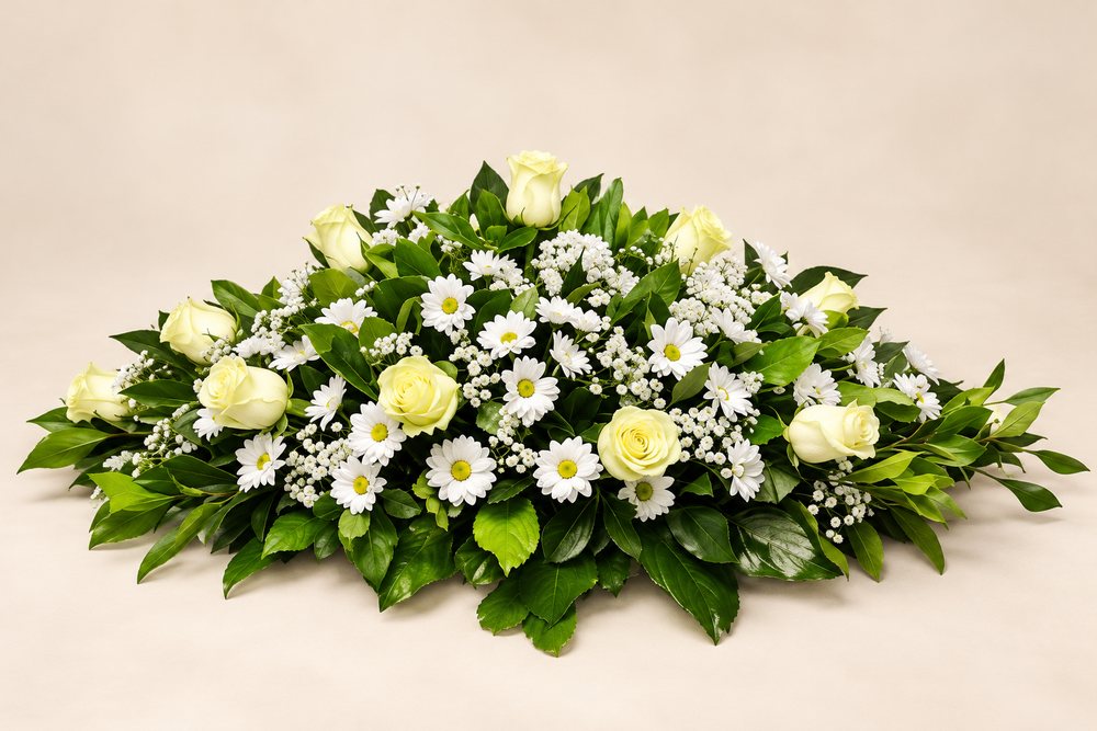 Cojín de condolencias con flores blancas